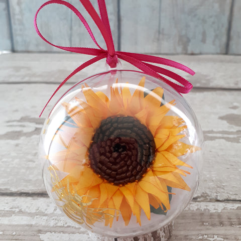 Paper sunflower in a bubble