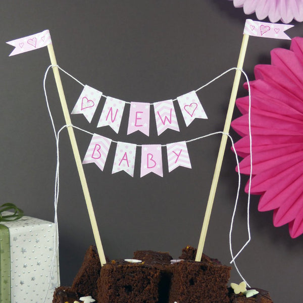 Pink baby girl baby shower cake bunting