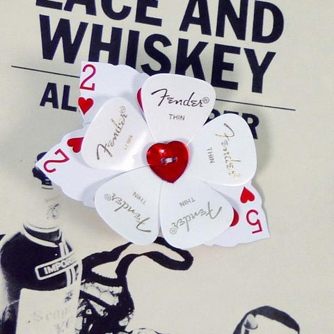 sheet music flower guitar pick buttonhole