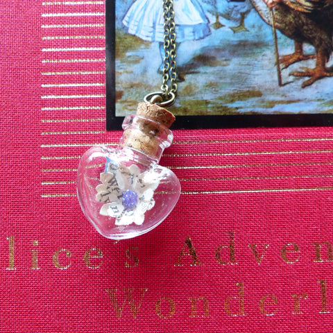 Alice in wonderland heart necklace