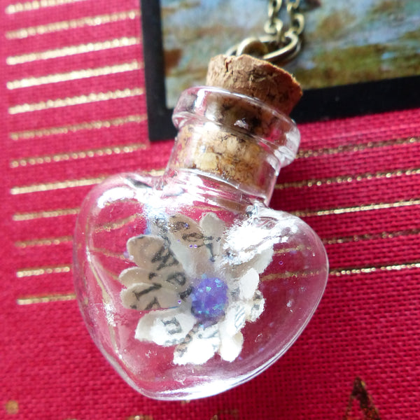 Alice in Wonderland daisy in Heart bottle necklace